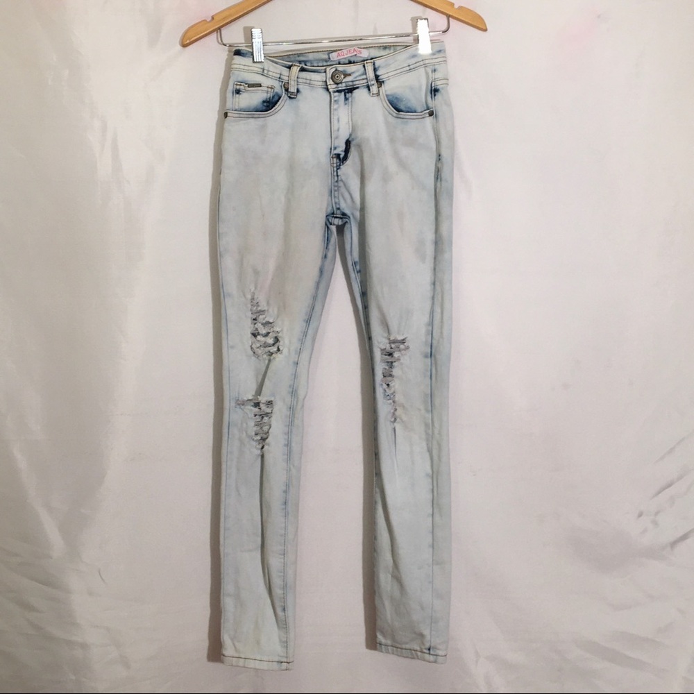 Acid washed distressed jeans